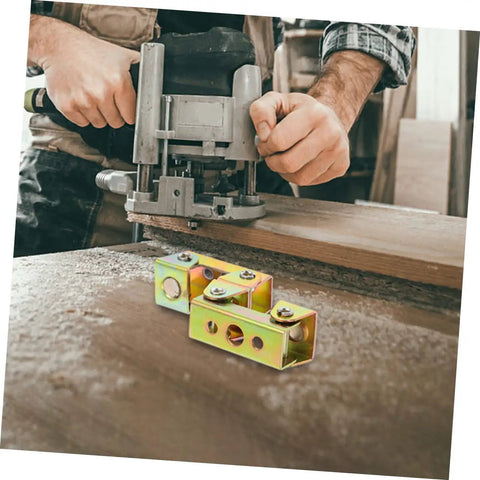 V Type Beefy Magnetic Welding Clamp Kit 4 Pack with adjustable welding fixture clamps next to a woodworker using a router