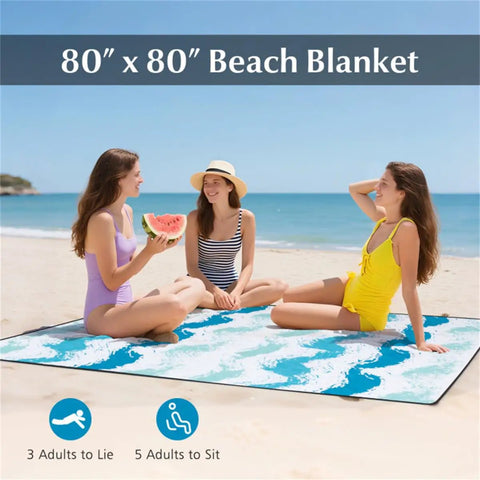 People sitting on an 80" x 80" beach blanket by the sea, part of Blue Four Piece Beach Set With Sun Proof Umbrella Two Folding Chairs Waterproof Blanket And Portable Beach Kit For Travel Camping And Chill Outdoor Fun On The Go