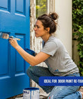 Woman using Two Pack 3 Inch Angle Paint Brushes With Durable Wooden Comfort Grip For Easy Control on blue door for smooth finish