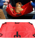 Heavy Duty Foldable Pet Stretcher With Secure Buckles Emergency Dog Carrier Transport Cot For Vet Runs Keeps Calm During Emergencies Supports 242 Pounds Solid As A Rock For Big Guys And Easy Hauling Red, showing a dog being carried.