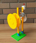 Hands-On Hand Crank Water Turbine Generator For Physics Class And DIY Hydroelectric Kit, student lab model with yellow wheels