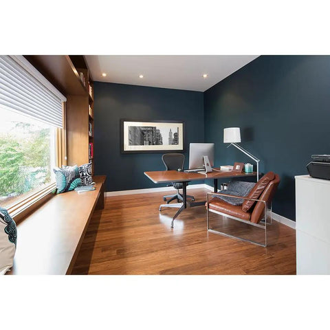 Modern office with wood flooring, desk, and Canless LED Recessed Light 6 Inch, 4 Pack, Wet Rated With Mounting Frame installed on ceiling.