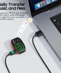 Clip-On MP3 Player With LED Light, 8GB Mini Music Player connected to laptop for file transfer