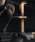 Heavy Duty Oxy Acetylene Torch Set With Cutting Welding And Heating Heads Four Piece Kit in use on metal workpiece