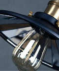 Kick Up Your Style With Adjustable Height Retractable Pulley System Vintage Black Metal Chandelier Ceiling Lamp close-up view of bulb and metal shade.