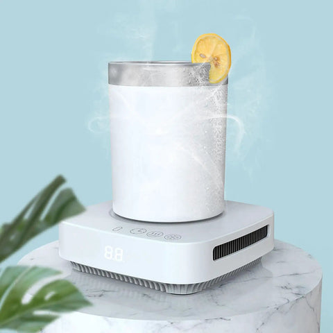 Keep Your Sip Game Strong With This Electric Cup Warmer And Chiller Featuring Three Auto Timer Modes for Piping Hot Coffee or Ice Cold Drinks Portable Desktop Cooler on a marble surface with a chilled cup.