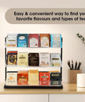 Three Tier Tea Bag Organizer With Clear Acrylic Compartments And Black Steel Frame Holds 15 Compartments For Coffee Station Storage On Countertop Or In Cabinet Great For Office And Kitchen displaying assorted tea bags
