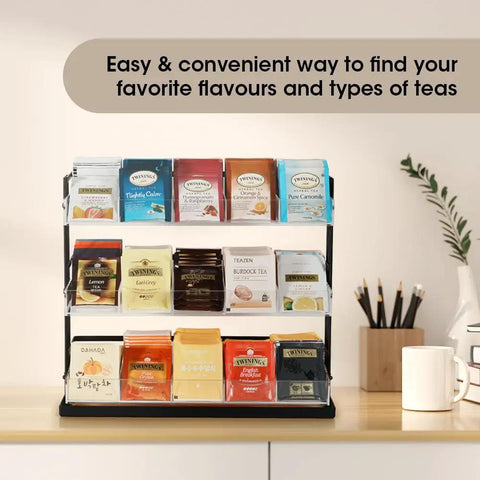 Three Tier Tea Bag Organizer With Clear Acrylic Compartments And Black Steel Frame Holds 15 Compartments For Coffee Station Storage On Countertop Or In Cabinet Great For Office And Kitchen displaying assorted tea bags