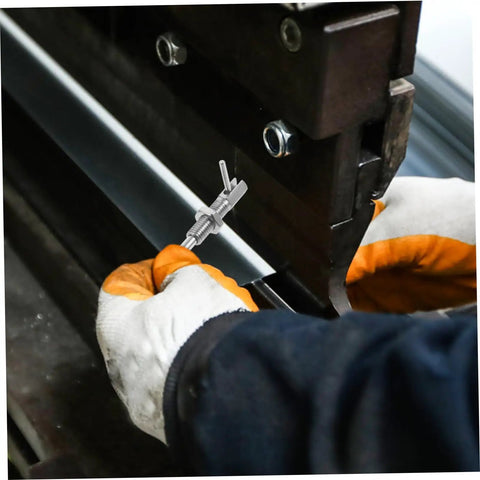 Top Shelf Stainless Steel Indexing Plunger Pin for durable securing, shown in use with gloved hand on metal fabricating equipment.