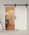 Front view of a 42 by 84 inch sliding barn door with seven foot hardware kit and handle, floor guides, pre drilled holes, easy assembly, waterproof PVC surface, H frame, white finish, DIY friendly installation manual included.
