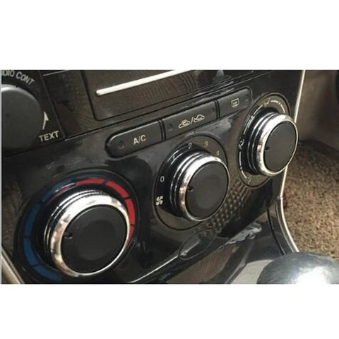 Up Your Auto Game With This Sleek Black Harayaa Car Air Conditioner Control Knob Kit Featuring Three Alloy Knobs For Vela Models Before 2006, Offering Superior Handling And A Premium Upgrade To Your Interior Dashboard Style Today. black alloy AC control knobs on Vela dashboard