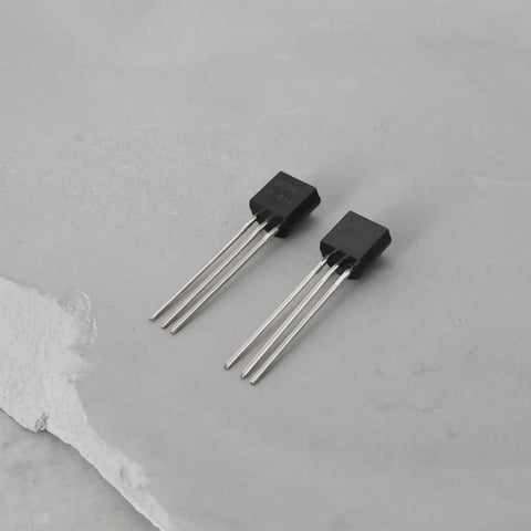 Two TO-92 transistors from Go-To Transistor Assortment Kit 100 Pcs NPN BC550C PNP BC560C for audio amplifiers and signal processing.