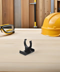 Heavy Duty Adjustable Plinth Leg Clips 12 Pack No Sweat Cabinet Leveler Hardware For Kitchen Cabinets Tables And Chairs Smooth Furniture Foot Adjusts Just Right For Any Floor on workbench with tools in background.