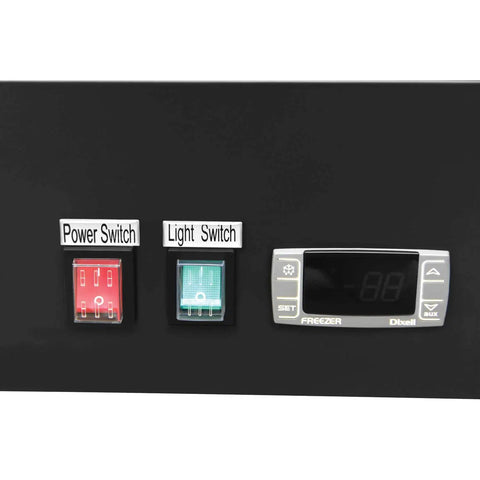 Control panel of Two Door Merchandiser Freezer With Forty Five Cubic Feet Of Cold Storage, featuring power and light switches.