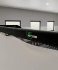Pro Series 9 Flex Golf Simulator Screen For Home Practice with black frame, featuring Net Return logo in indoor setting.