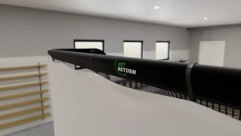 Pro Series 9 Flex Golf Simulator Screen For Home Practice with black frame, featuring Net Return logo in indoor setting.