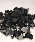 Pile of black Twist In Shelf Pins 8 Pack Black Durable 5mm Shaft Angled 3D Printed Pegs For Adjustable Shelving