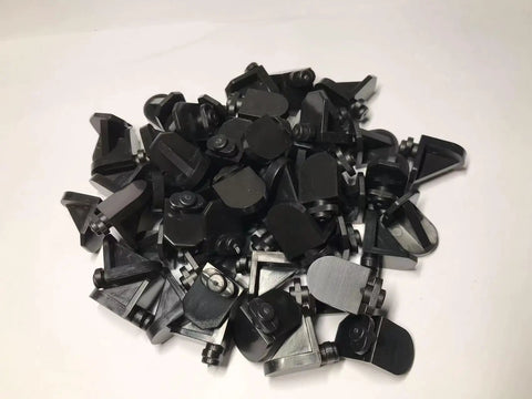 Pile of black Twist In Shelf Pins 8 Pack Black Durable 5mm Shaft Angled 3D Printed Pegs For Adjustable Shelving
