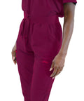 Close-up of Women's Slim High Waisted Jogger Scrub Pants Yoga Style Nursing Uniforms Wine Color Buttery Soft Healthcare Workwear.