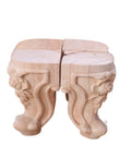 Two intricately carved wooden legs from Four Pack Wooden Furniture Support Legs Replacement Feet For Sofa, Bed, Table And Cabinet.