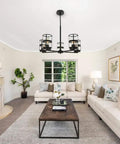 Living room with five light pendant lighting fixture with vintage farmhouse clear glass shades, height adjustable chandelier