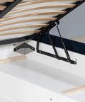 Heavy Duty Triangle Corner Brackets 10 Pack for Furniture and Cabinets with Pre Drilled Holes Right Angle Shelf Supports in use on wood bed frame