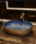 USZWBY Vessel Sinks Bathroom Vessel Sink Oval Ceramic Washbasin Vintage Art Countertop Basin Utensils with Faucet Bathroom Bowl Sink on marble countertop.