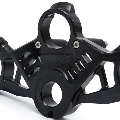 Close-up of black anodized Premium CNC Aluminum Top Triple Tree Clamp for 2020-2024 ZX-25R and ZX-4R motorcycles, precision machined.