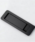 Top Shelf Ultra Thin Pocket Door Pull Handle With Wide Recessed Finger Grip And Flush Mount Setup For Sliding Doors Or Space Saving Drawers In Fresh Satin Black Finish, top view of handle on white background.