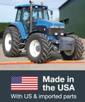 Tractor driving over Rugged Drive Over Cable Protector For 1.25 Inch Lines With Heavy Duty 17k Axle Load Drop Over Ramp