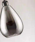 Close-up of teardrop shape from Three Pack Industrial Glass Pendant Lights For Kitchen Island With Chrome Mirror Finish.