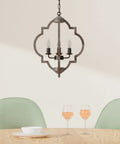 Dope Four Light Farmhouse Wood Chandelier With Rustic Orb Pendant Lighting Fixture above dining table with wine glasses