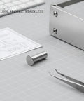 Top Shelf Stainless Steel Semi Tubular Rivets Featuring Flat Head Profile For Slick Sheet Metal Joining And Dead Solid Fastening Assembly Every Contractor Relies On placed beside wiring schematic and tweezers.