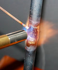 1 Lb Value Pack 5 Percent Silver Phosphor Copper Brazing Rods BCuP-3 For Welding showing rod during use with torch