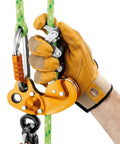 Zigzag Plus Descender for Arborists with smooth rope feed and auto-locking friction chain in hand gripping climbing rope