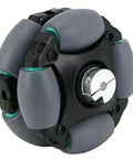 Front view of an 85mm gray plastic omni wheel with rubber rollers and metal drive hub.