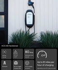 64 Amp EV Charger HCS 80 Hardwired 240V 15.4kW Power With Rugged J1772 Connector on exterior wall, safety certified