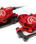 Heavy Duty Hydraulic Disc Brake Set Front And Rear With Two Piston Aluminum Calipers Long Brake Lines For Mountain Road Bicycles Sick Stopping Power close-up of red calipers.