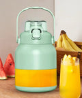 Portable Handheld Electric Citrus Juicer, Automatic Lemon And Orange Press With Ergonomic Non-Slip Grip For Quick One-Handed Fresh Juice Making On The Go Home Kitchen Or Travel with juice container and glass.