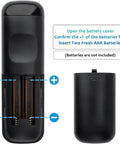 Back view of Two Pack Universal Remote For Roku Smart TVs showing battery compartment open, black color, requires AAA batteries.
