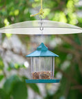 Weatherproof outdoor bird feeder cover dome as a protection shield, easy installation, durable rain guard for hanging feeders