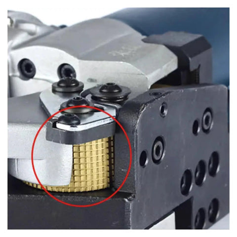 Close-up of Heavy Duty Electric Strapping Machine DD19A showing sealing mechanism for PET plastic and steel belt.