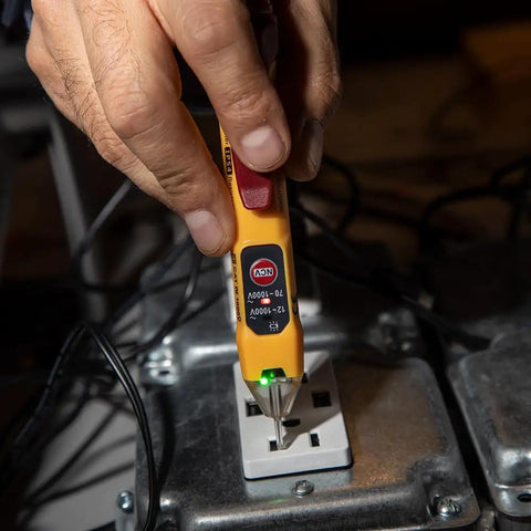 Non Contact Voltage Tester With Outlet Tester detecting live cables, bright green LED indicator, dual range 12 to 48V AC and 48 to 1000V AC