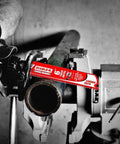 Diablo 9-inch carbide teeth reciprocating saw blade installed in metal lathe cutting a pipe.