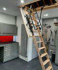 Top Shelf Electric Attic Pull Down Stairs With Wireless Remote Fits Ceilings 7Ft 8In To 9Ft 6In Beech Hardwood Tread in garage.