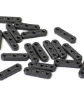 B1314 Bowsie For Eclipse Sailboat Replacement Part Upgrade Kit, durable black plastic pieces with multiple holes, top view