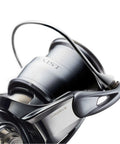 Close-up of Exist LT Spinning Reel with Lightweight MQ Body, ZAION Construction, Airdrive Rotor and Spool for smooth casting.