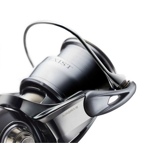 Close-up of Exist LT Spinning Reel with Lightweight MQ Body, ZAION Construction, Airdrive Rotor and Spool for smooth casting.