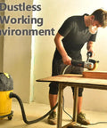 Person using Powerful 1300W Burnishing Polishing Machine With Steel Wire Wheel For Concrete Metal Stainless Steel Wood Exterior Renovator Heavy Duty Polisher That Shines Up Fast And Delivers Smooth Finish in a workshop with dust extractor