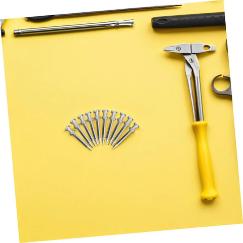 20 Pcs Lawn Aerator Shoes Pegs 5.8cm Spikes For Garden Soil Aeration And Grass Care with hammer and tools on yellow background